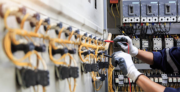 Professional Electrician technician working in Solana, FL